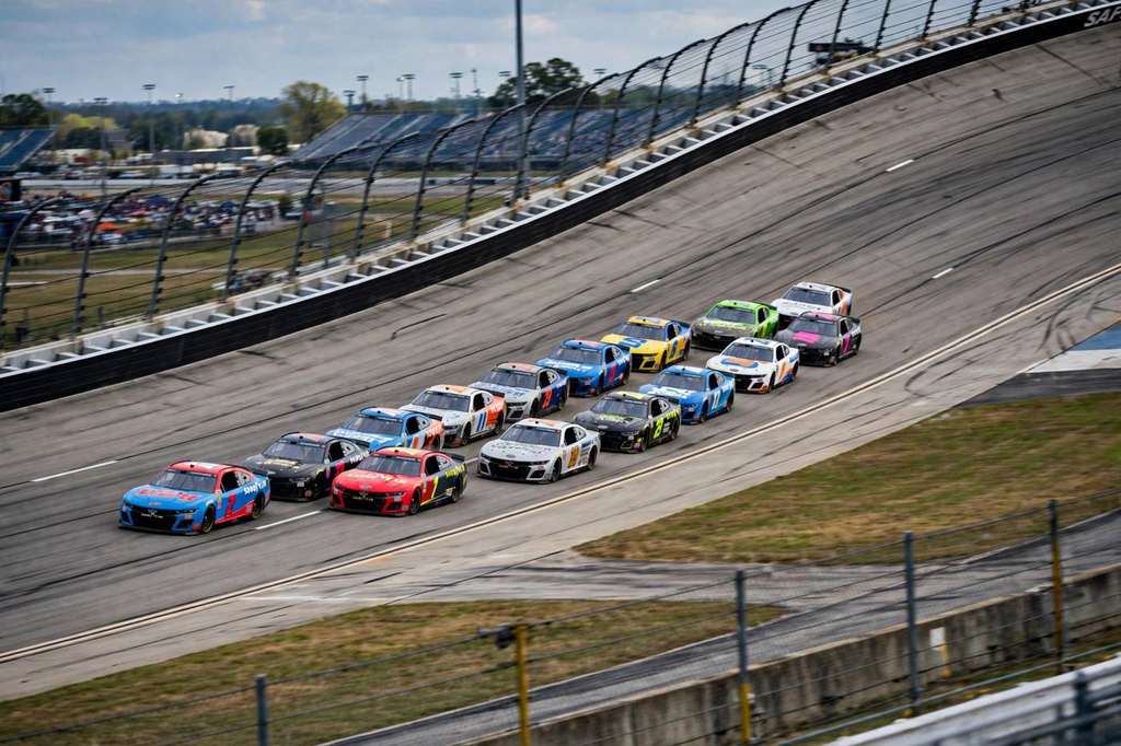 Larson Wins Talladega YellaWood 500 in Photo Finish and Extends Title Lead to 73 Points